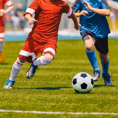 Football Soccer Players Running with Ball. Footbal